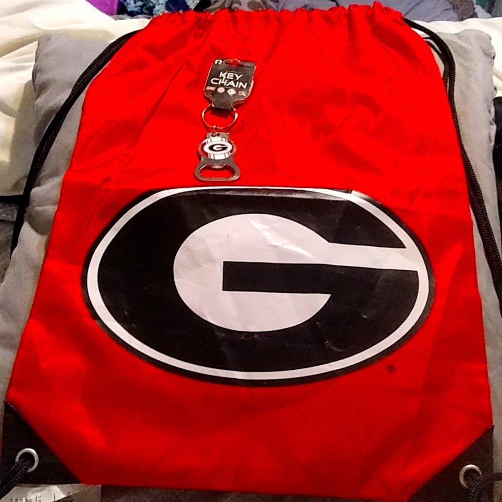 *NCAA Georgia Bulldogs Russell key chain bottle opener & drawstring backback.